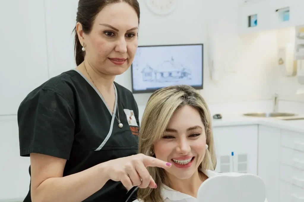 Cosmetic veneer consultation at Park St Dental Practice, Dr Neda Gorji, best Cosmetic Dentist in Sydney, Northern Beaches Best Implant Dentist, Best Implant Dentist, Dentist discussing dental treatment with patient, Dr Neda Gorji providing dental treatment to Invisalign patient, Park St Denal Practice, Dr Neda Gorji and Associates, Mona Vale Dental Implant Centre,Invisalign Dr, Invisalign Near me, Invisalign in Mona vale, Orthodontic treatmStraight teeth, Crooked teeth, , Best Cosmetic Dentist Near Me, Park St Dental Practice, Mona Vale Dentist, Dr Neda Gorji and Associatesntal Practice, Dr Neda Gorji & Associates, Mona Vale Best Cosmetic Dentist, Best Dentist In Mona Vale, Straight teeth, Northern Beaches Cosmetic Dentist, Smile Makeover, porcelain veneers, smile Design in Mona Vale